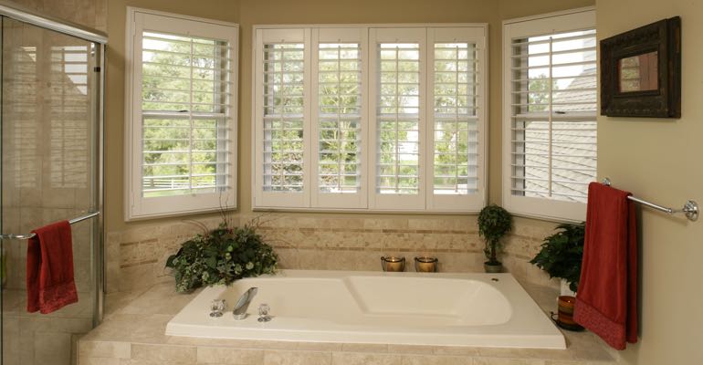 Plantation shutters in Hartford bathroom.